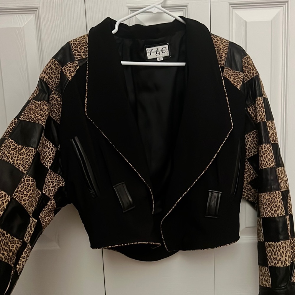 Vintage Animal print jacket with square detailing. TLC is the brand size L